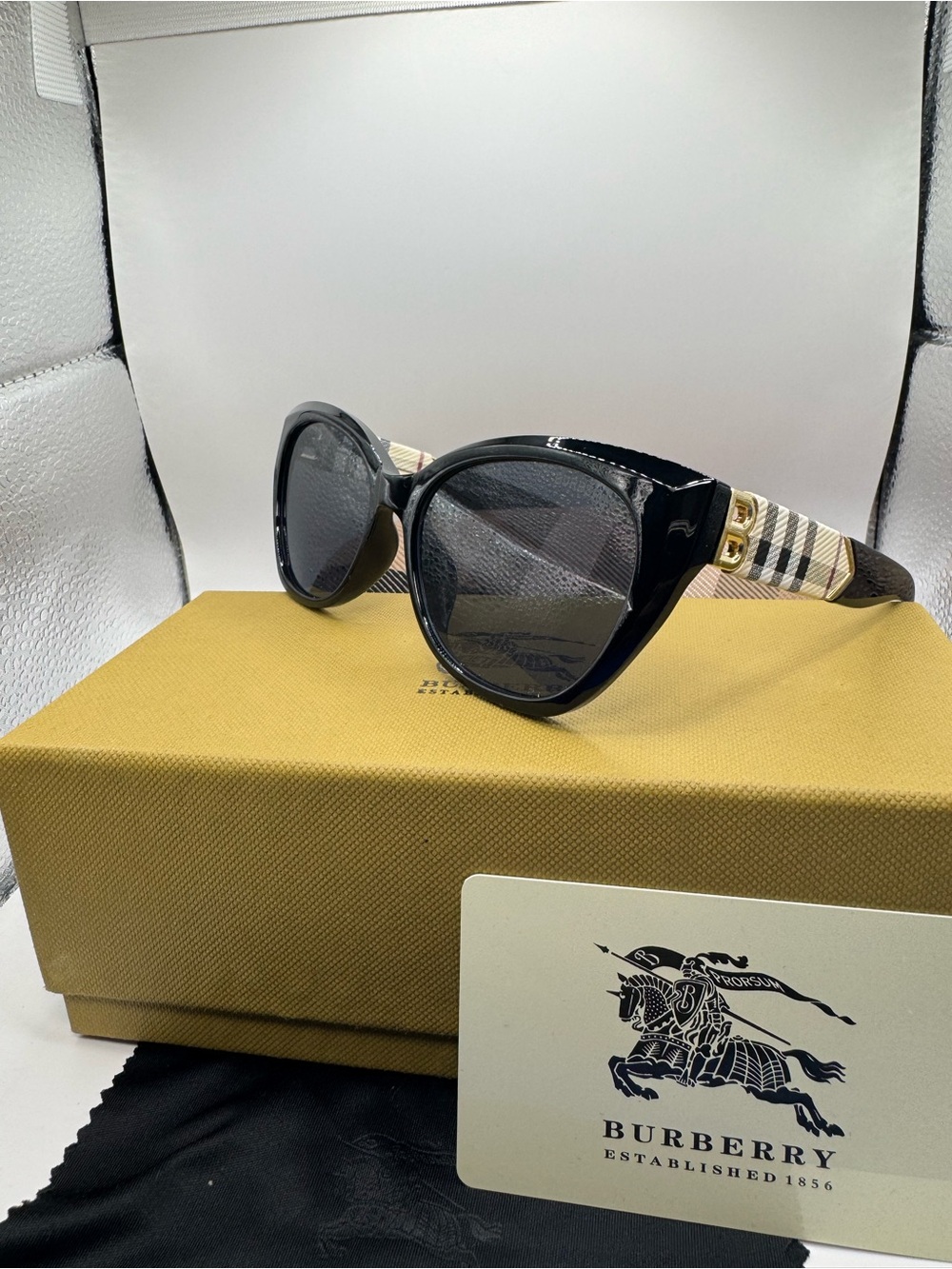 Burberry Black Cat-Eye Sunglasses with Beige Check Arms and Gold Accents